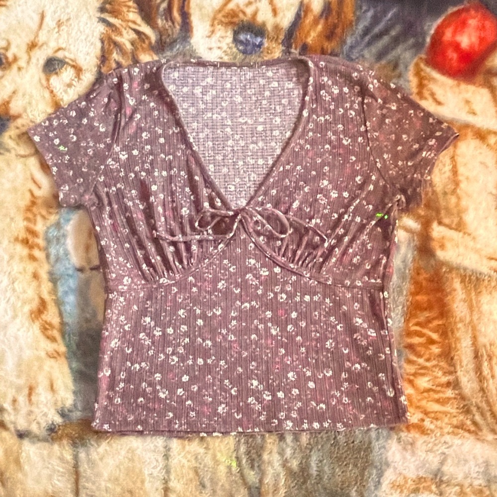 brown v-cut top with flowers